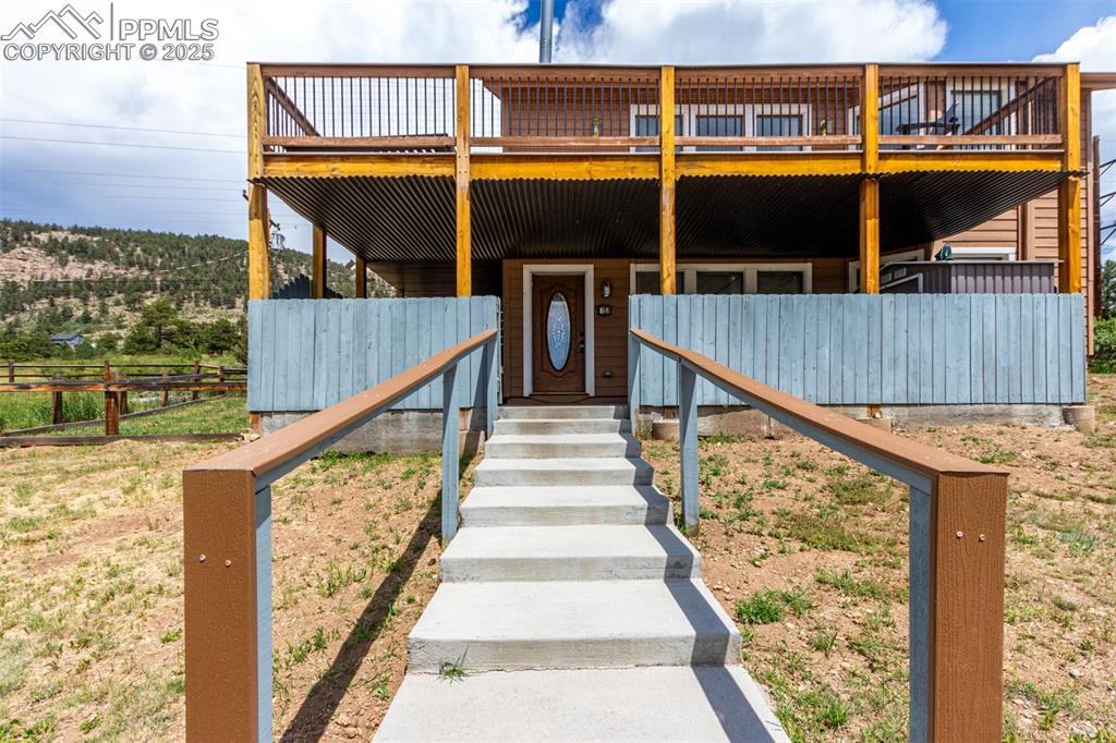 73 Sunlight Lane Bailey, CO 80421 - Photo 31 of 33 View of front facade featuring a deck