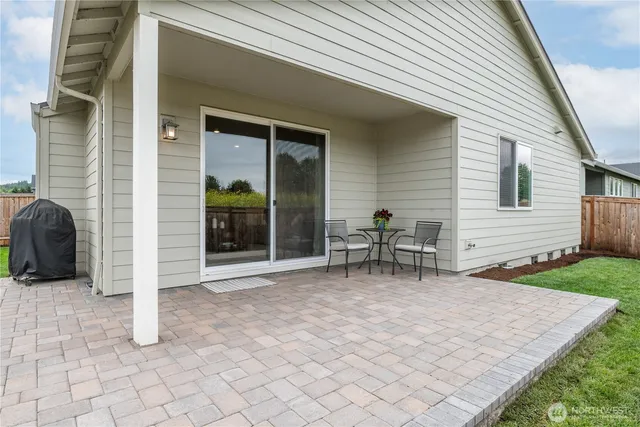 a backyard of a house with seating space