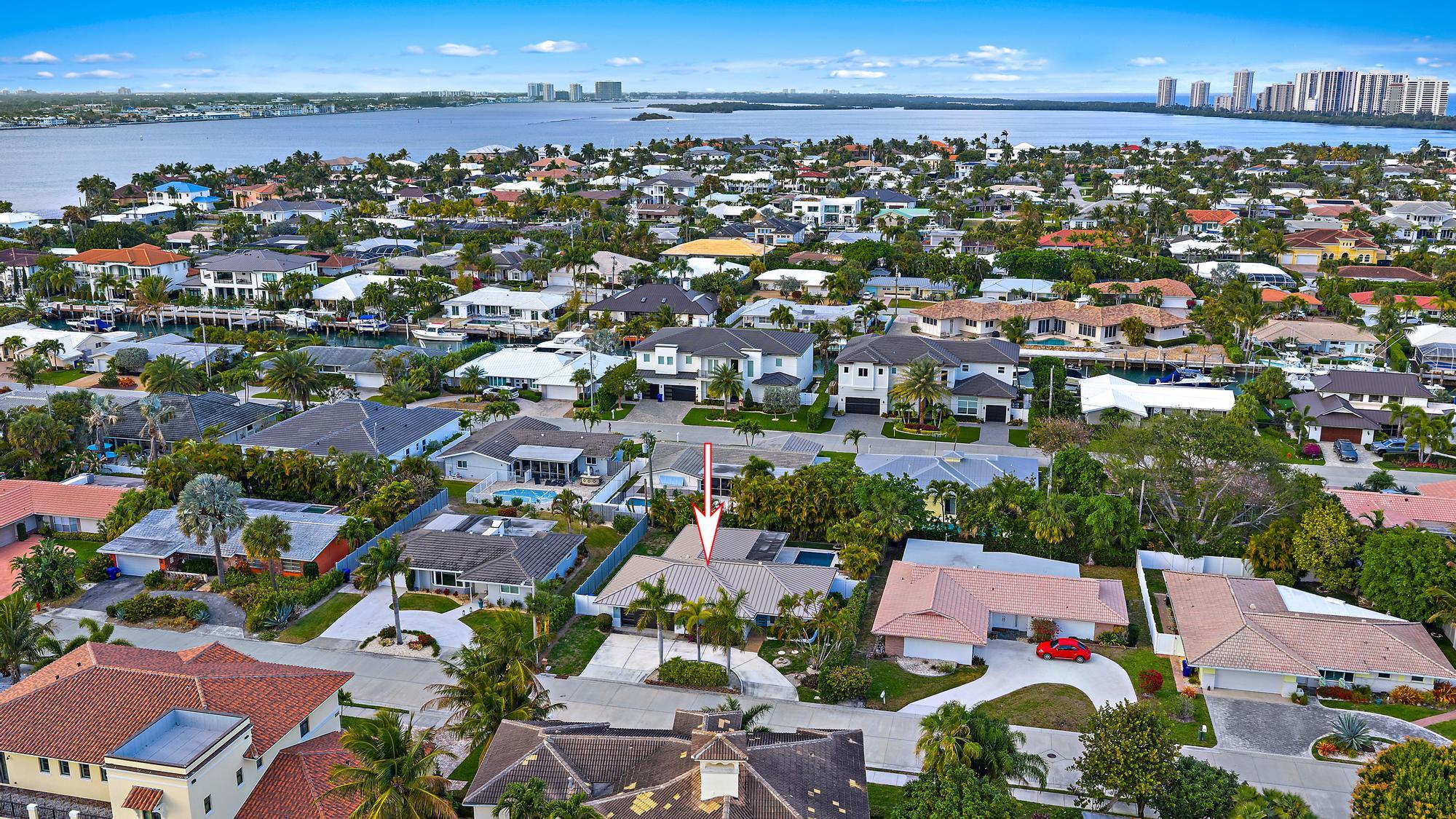 1120 Singer Drive Riviera Beach, FL 33404 - Photo 32 of 37 an aerial view of a city
