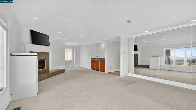a kitchen with a sink and a stove top oven