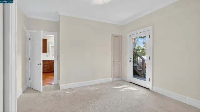 a kitchen with stainless steel appliances granite countertop a stove a sink dishwasher a refrigerator and wooden cabinets