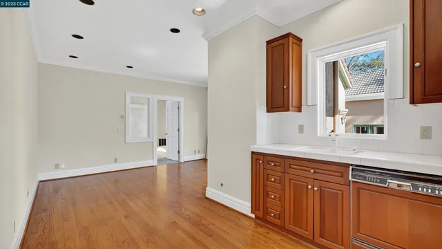 a view of a house with backyard and deck