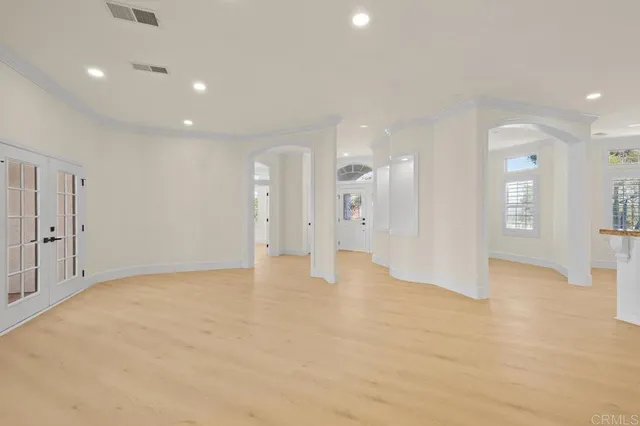 a bathroom with a double vanity sink mirror and