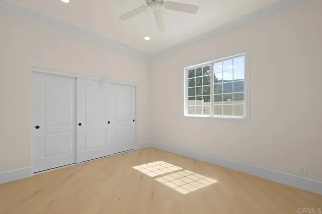 an aerial view of a house with outdoor space