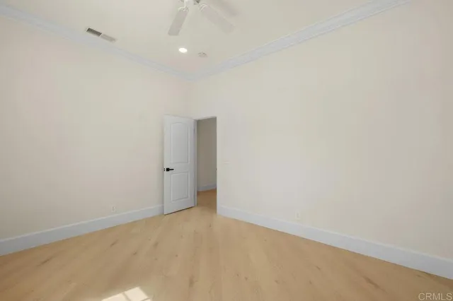 an aerial view of a house with a garden