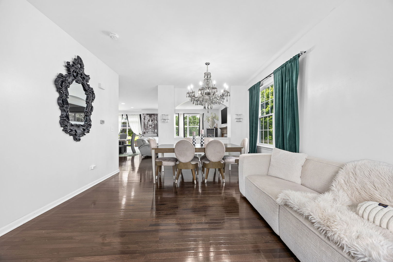 2297 Deerpath Road Bolingbrook, IL 60490 - Photo 8 of 46 a living room with furniture dining table and a chandelier