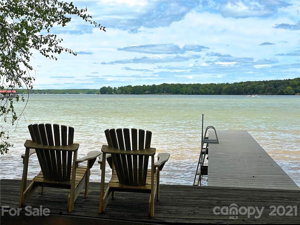 5016 Kiser Island Road Terrell, NC 28682 - Photo 12 of 37 a view of a roof deck with chair and wooden floor