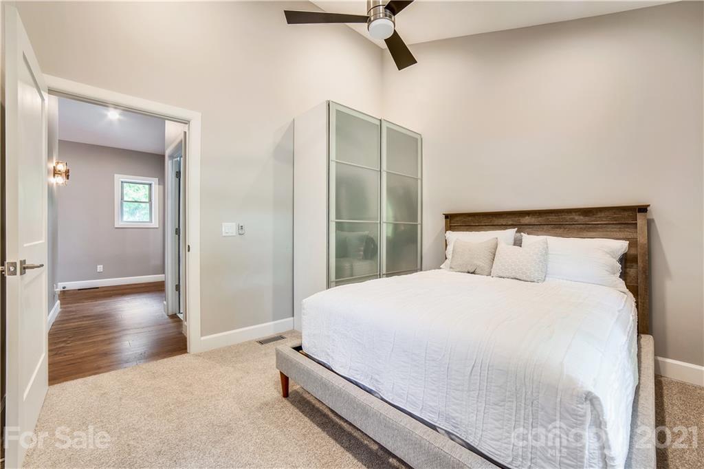 5016 Kiser Island Road Terrell, NC 28682 - Photo 36 of 37 a bedroom with a bed and a walk in closet