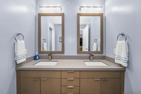 a kitchen with kitchen island a sink stove and refrigerator