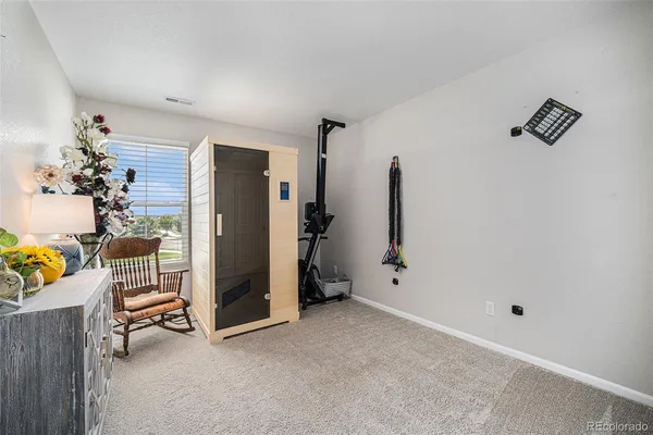 a view of a room with gym equipment