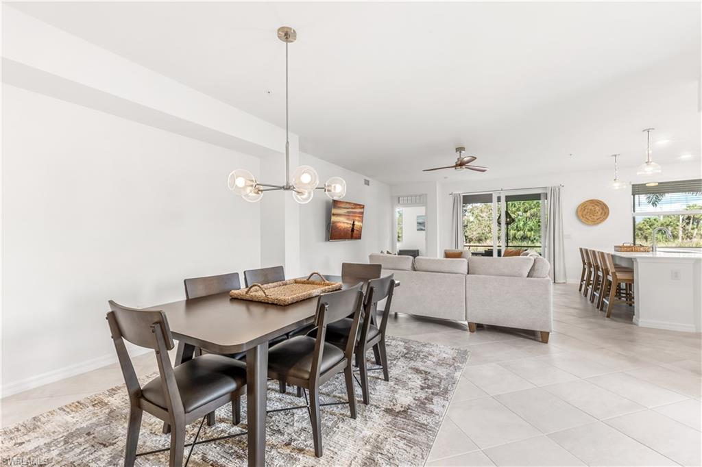 43333 Water Bird Way, Unit 4812 Babcock Ranch, FL 33982 - Photo 6 of 19 a dining room with furniture and window