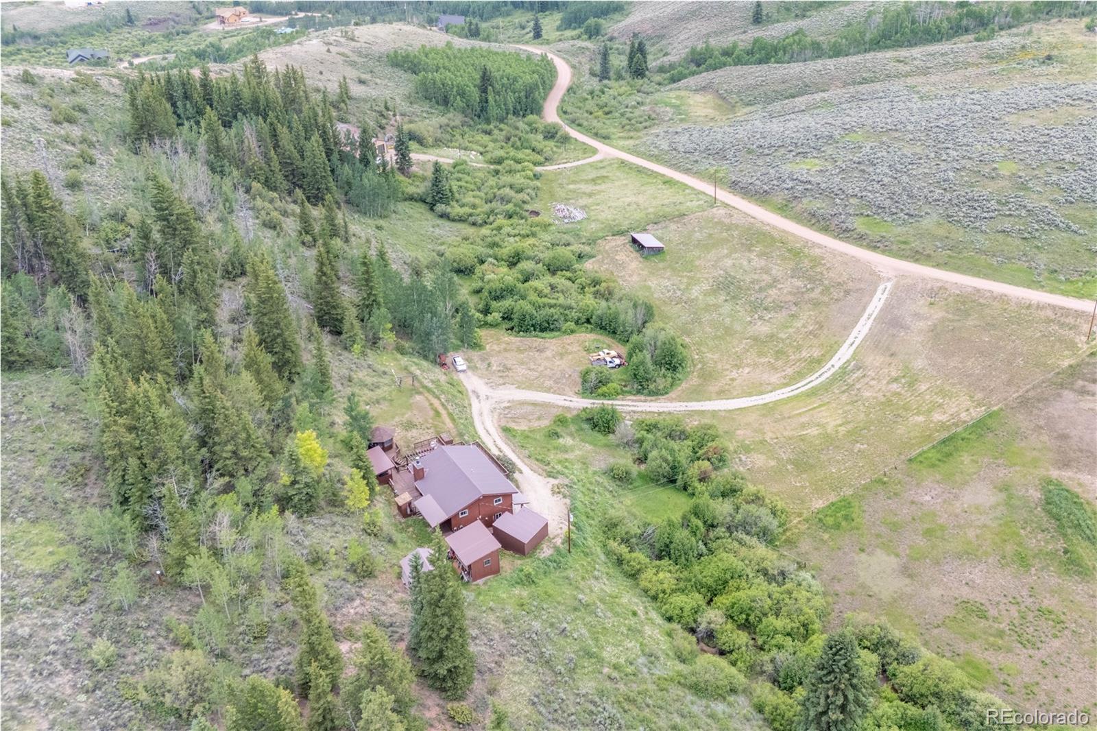 360 Gcr 194 Kremmling, CO 80459 - Photo 18 of 50 a view of a swimming pool with a yard