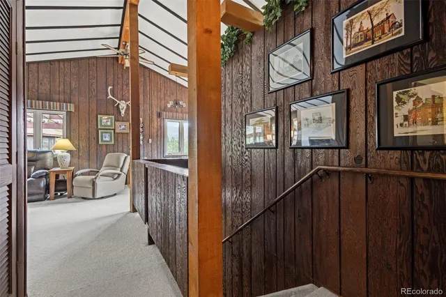a bathroom with a sink a toilet and shower curtain