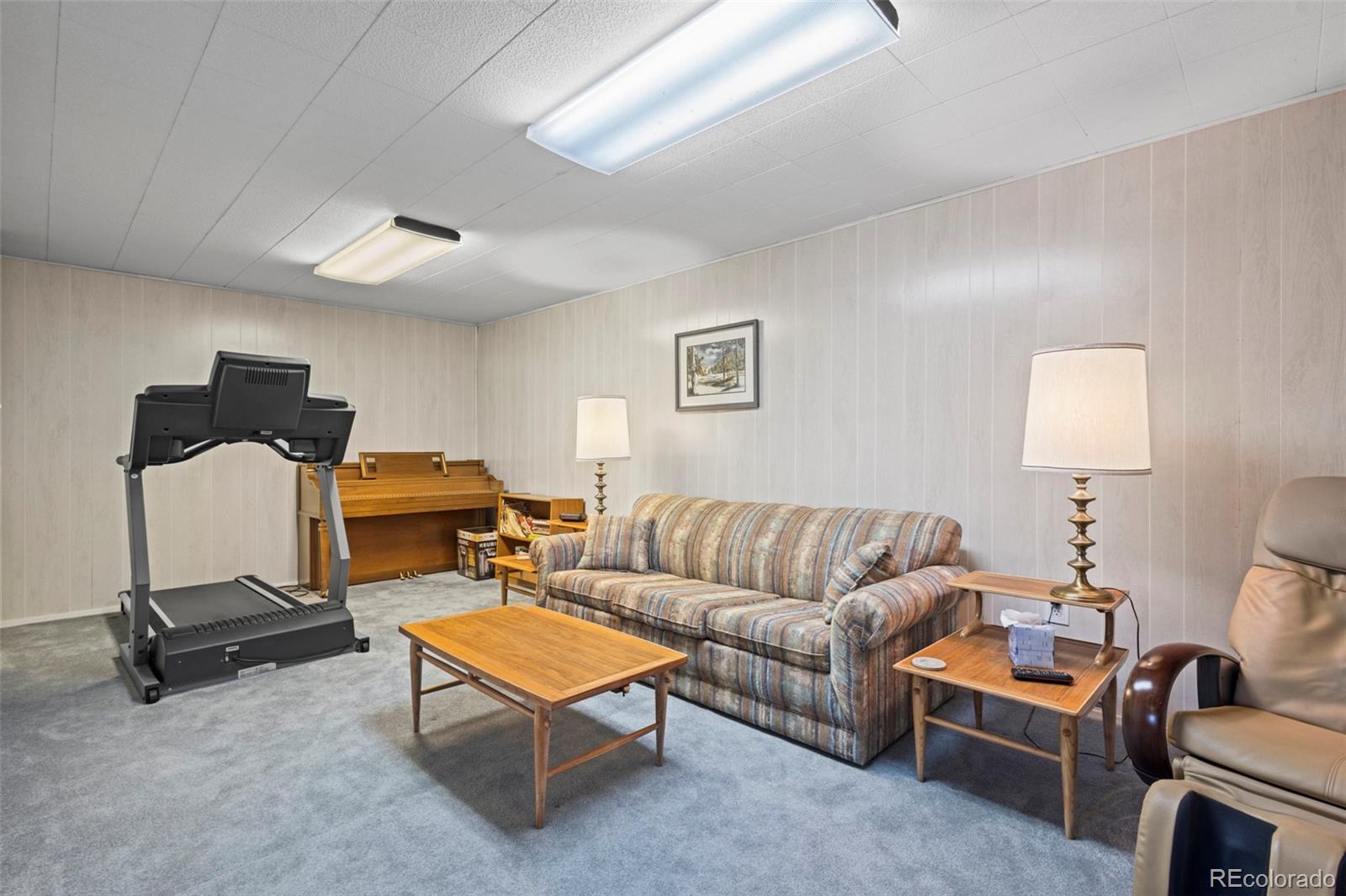 360 Gcr 194 Kremmling, CO 80459 - Photo 36 of 50 a living room with furniture a flat screen tv and a lamp