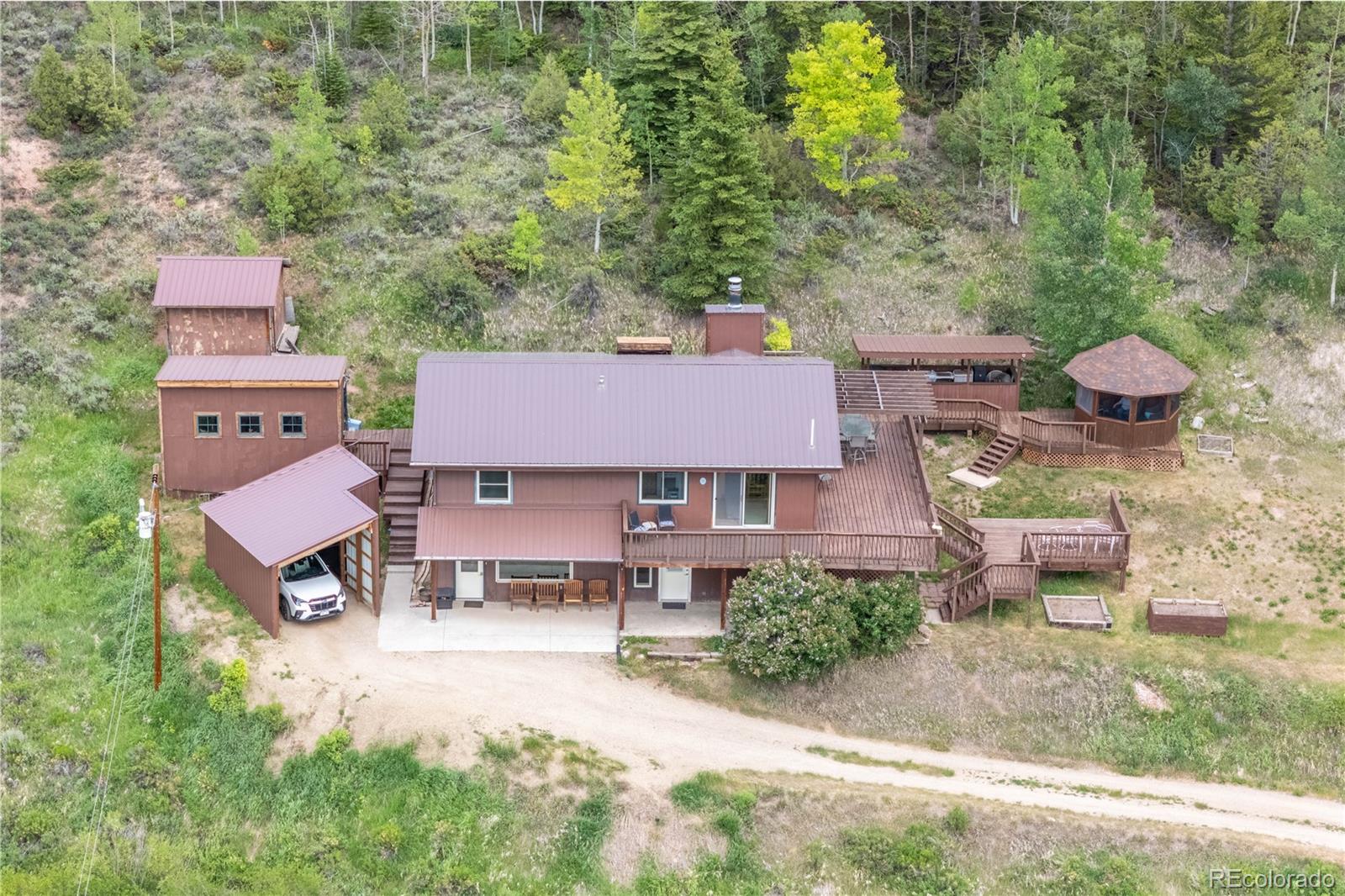 360 Gcr 194 Kremmling, CO 80459 - Photo 7 of 50 an aerial view of a house with yard