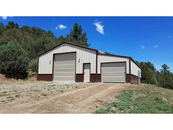 a black and white photo of a house