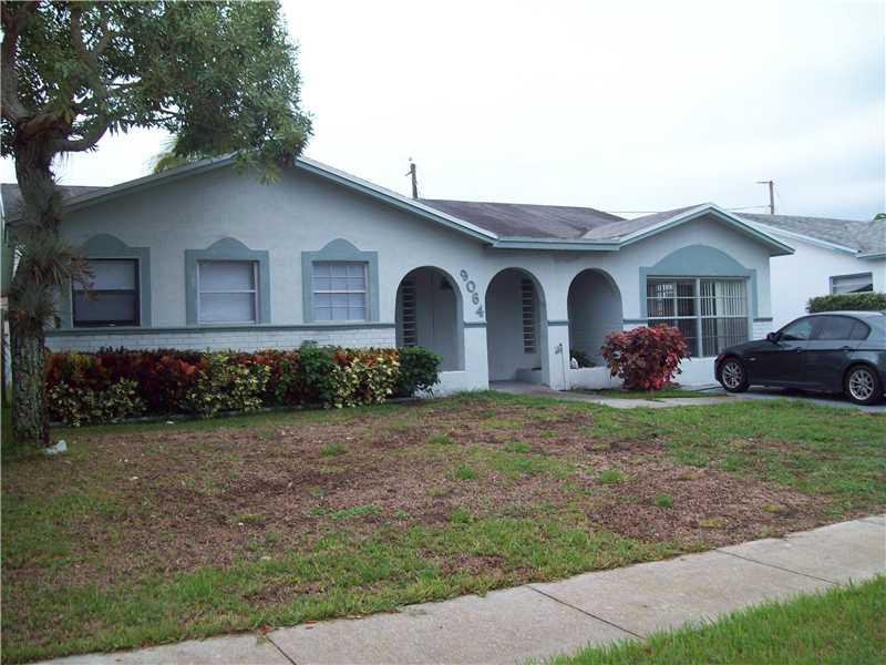 9064 Southwest 1st Street Boca Raton, FL 33428 - Photo 1 of 22 Exterior Front