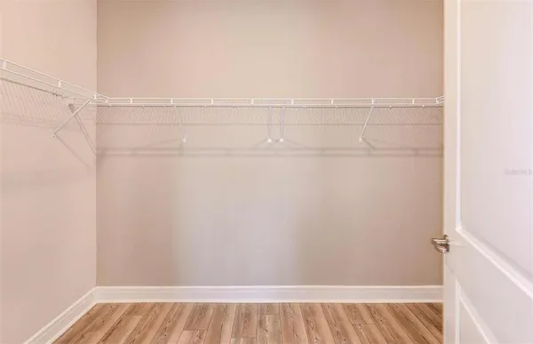 a view of a room with racks on the wall