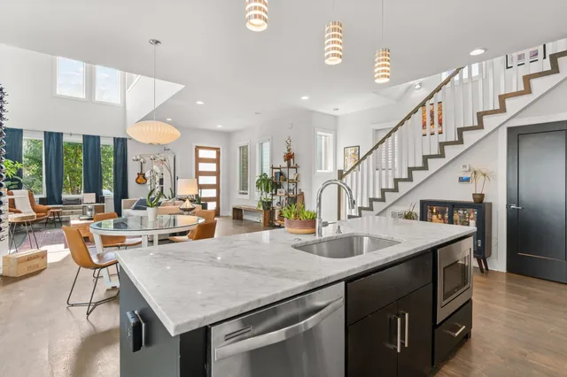 a view of dinning table and chairs in a room