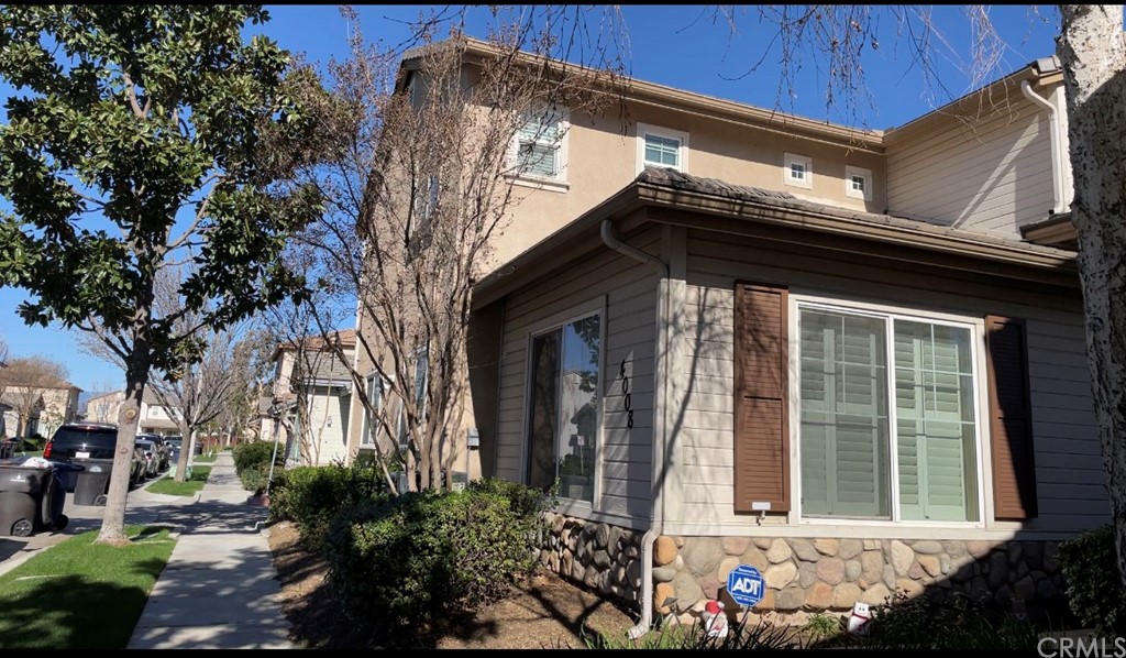 4008 Alicia Court Riverside, CA 92501 - Photo 1 of 1 a front view of a house with a yard