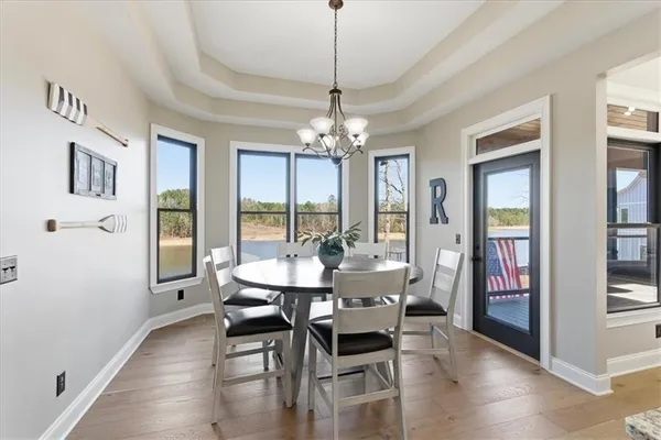 a bedroom with a large bed and a flat screen tv