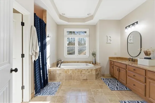 a living room with furniture and flat screen tv