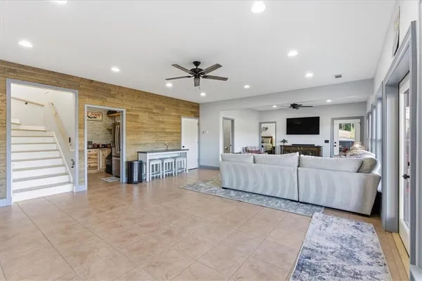 a view of a lake with a house in the background