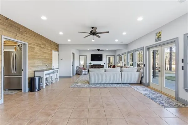 a view of a floor to ceiling window with wooden floor
