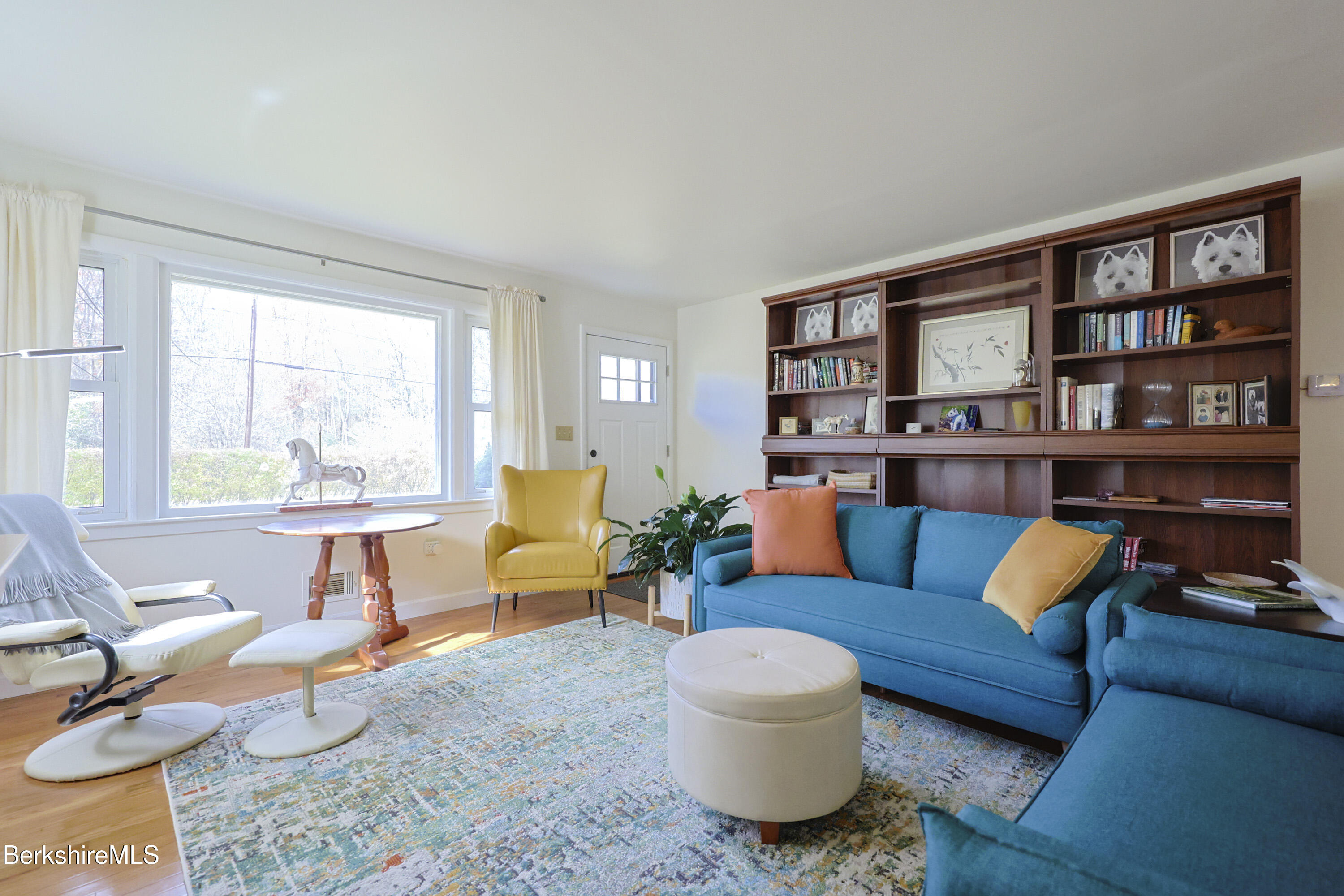 16 East New Lenox Road Lenox, MA 01240 - Photo 19 of 31 a living room with furniture and a large window