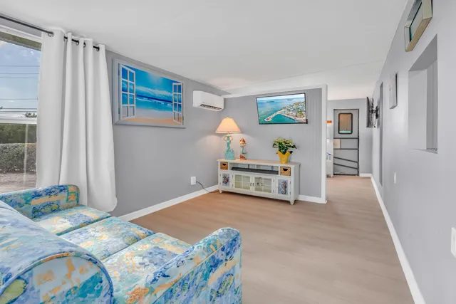 a living room with furniture and window