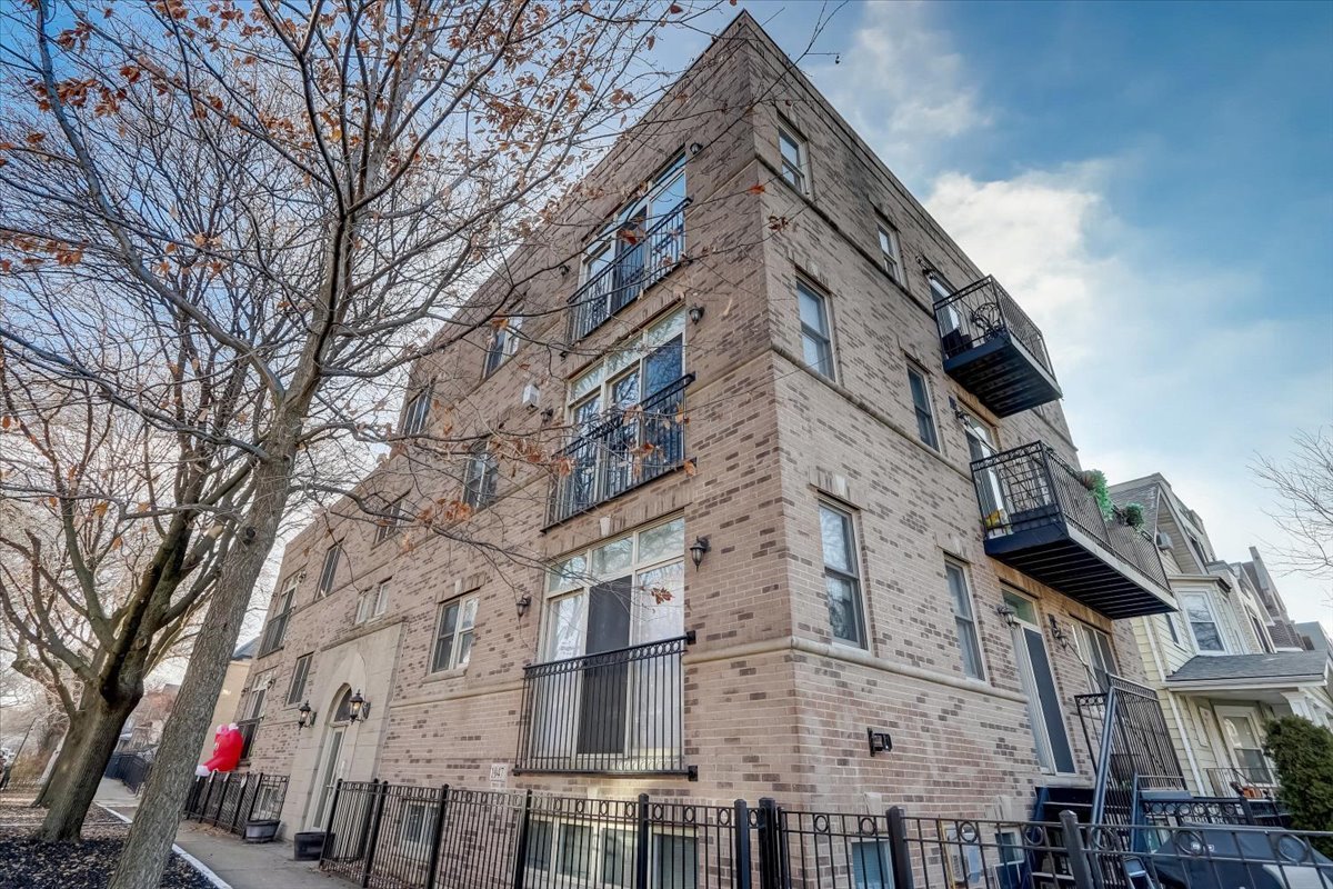 Undisclosed Address Chicago, IL 60657 - Photo 1 of 23 a view of a building with a snow in the background