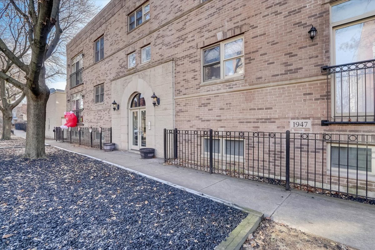 Undisclosed Address Chicago, IL 60657 - Photo 2 of 23 a view of a entrance gate of the house