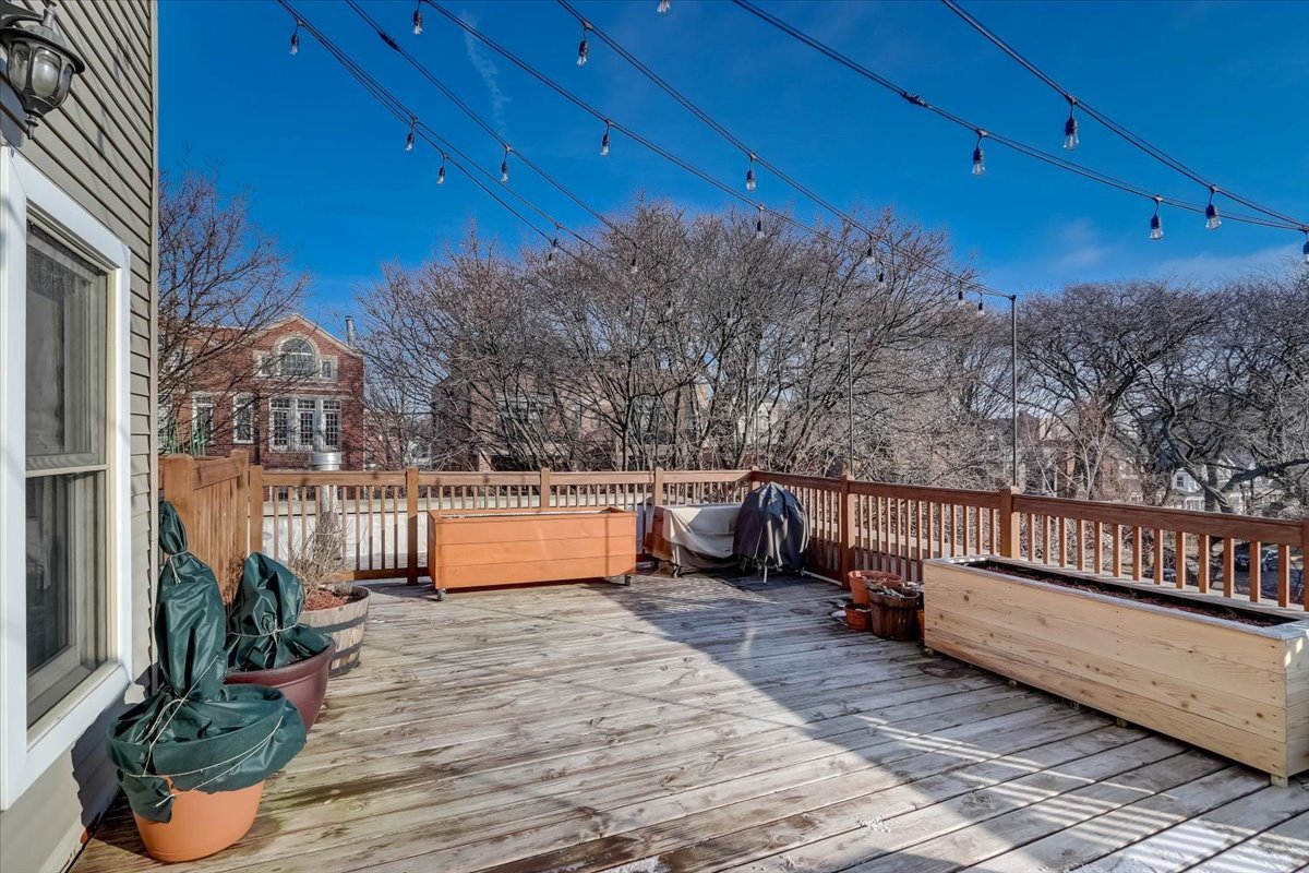 Undisclosed Address Chicago, IL 60657 - Photo 21 of 23 a view of a backyard with sitting area