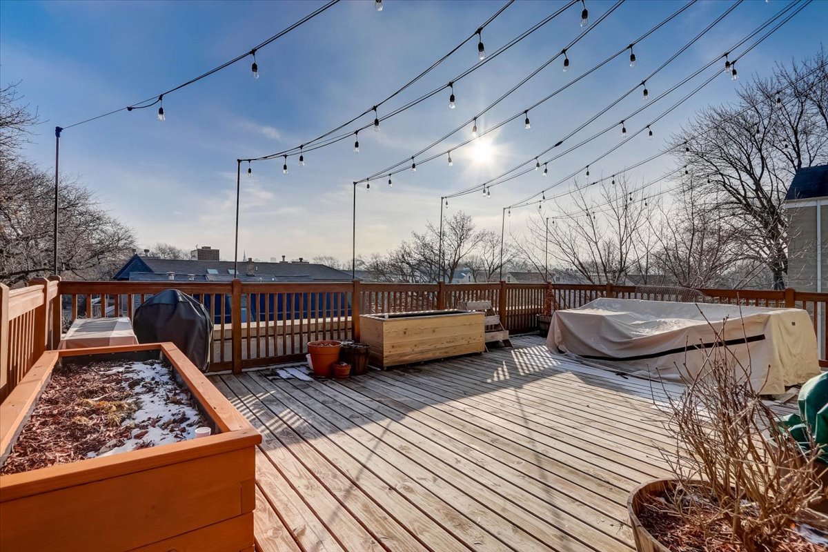 Undisclosed Address Chicago, IL 60657 - Photo 22 of 23 a view of a roof deck with couches