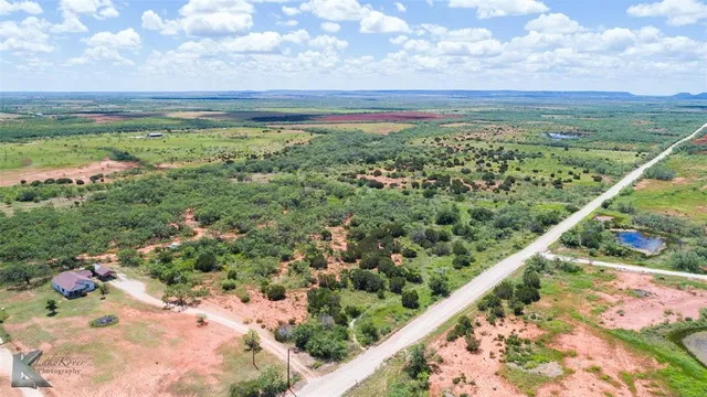a view of a lake with a city view