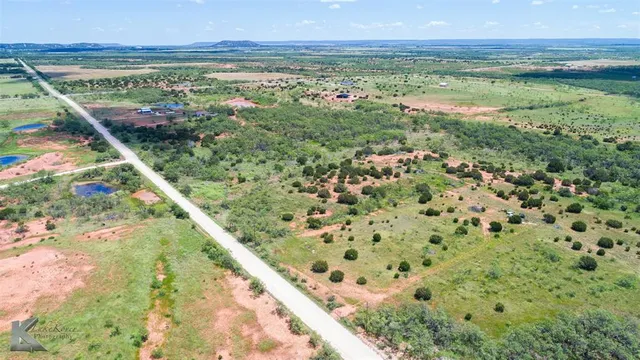a view of a garden from a balcony