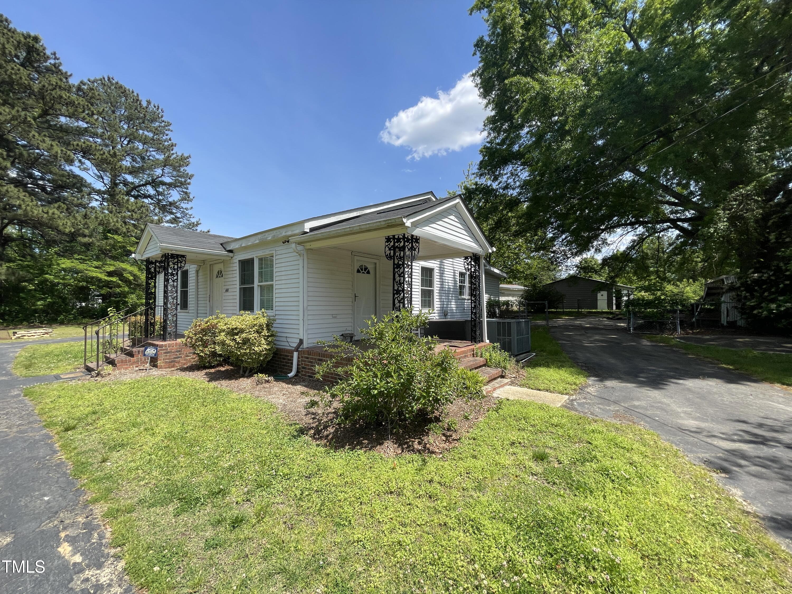 400 Field Street Cary, NC 27513 - Photo 12 of 12 a front view of house with yard and green space