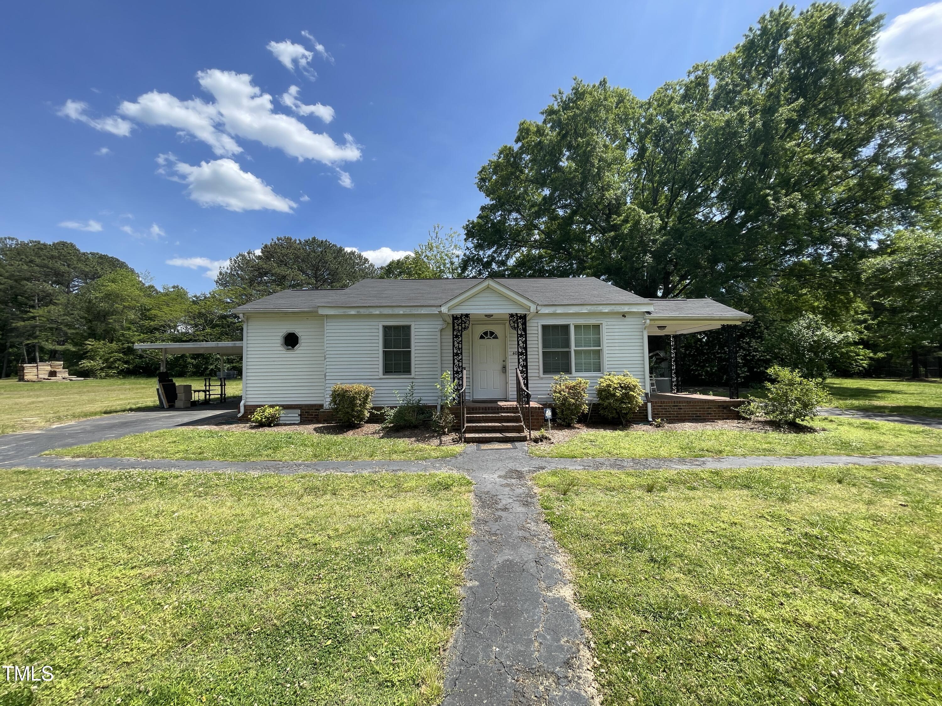 400 Field Street Cary, NC 27513 - Photo 6 of 12 a front view of house with yard and green space