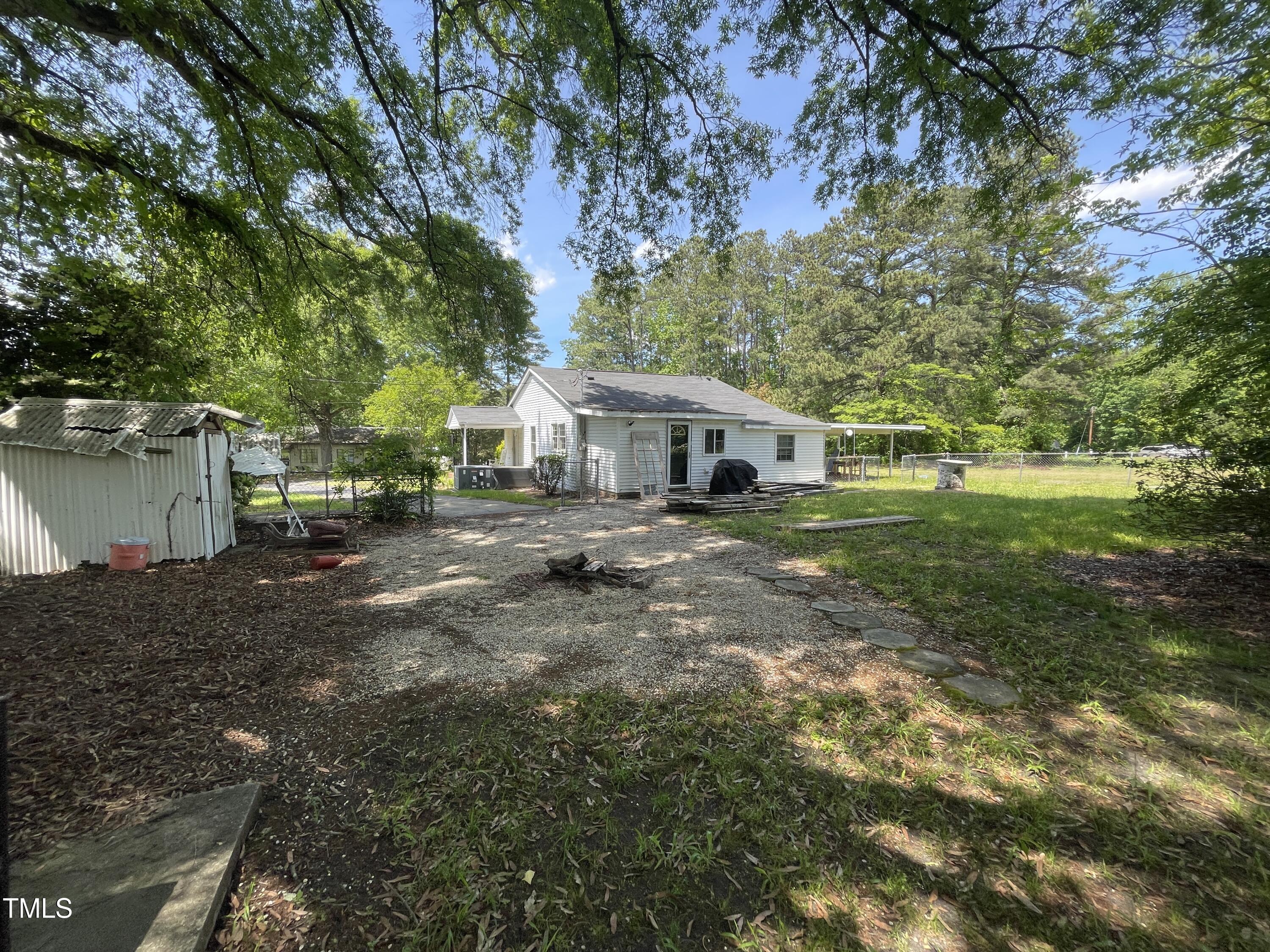 400 Field Street Cary, NC 27513 - Photo 10 of 12 a view of house with outdoor space
