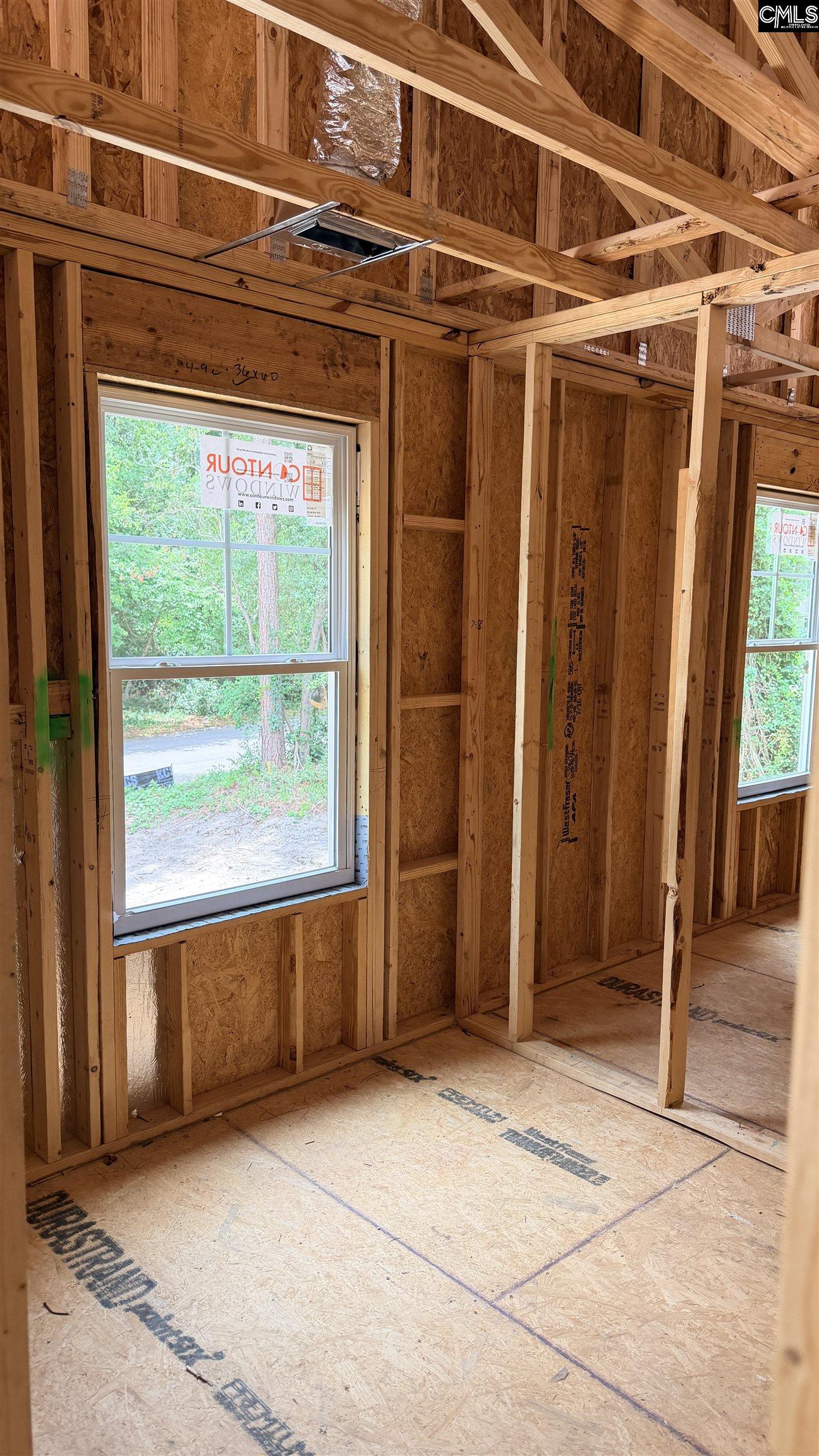 29 Old Still Road Columbia, SC 29223 - Photo 20 of 26 a view of a room with wooden floor and windows