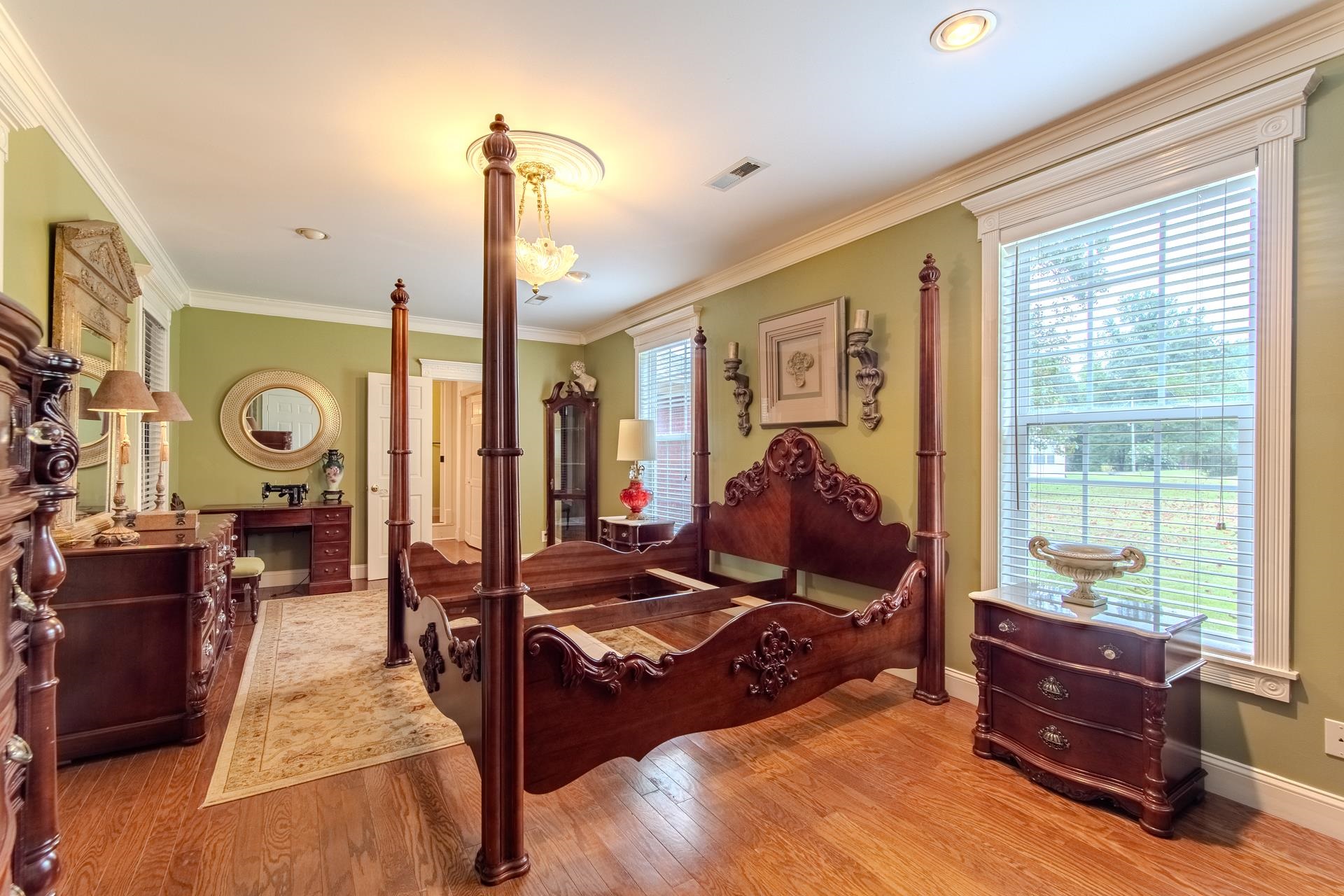 312 Smith Street Michie, TN 38357 - Photo 14 of 40 a living room with furniture hard wood floor and a floor to ceiling window