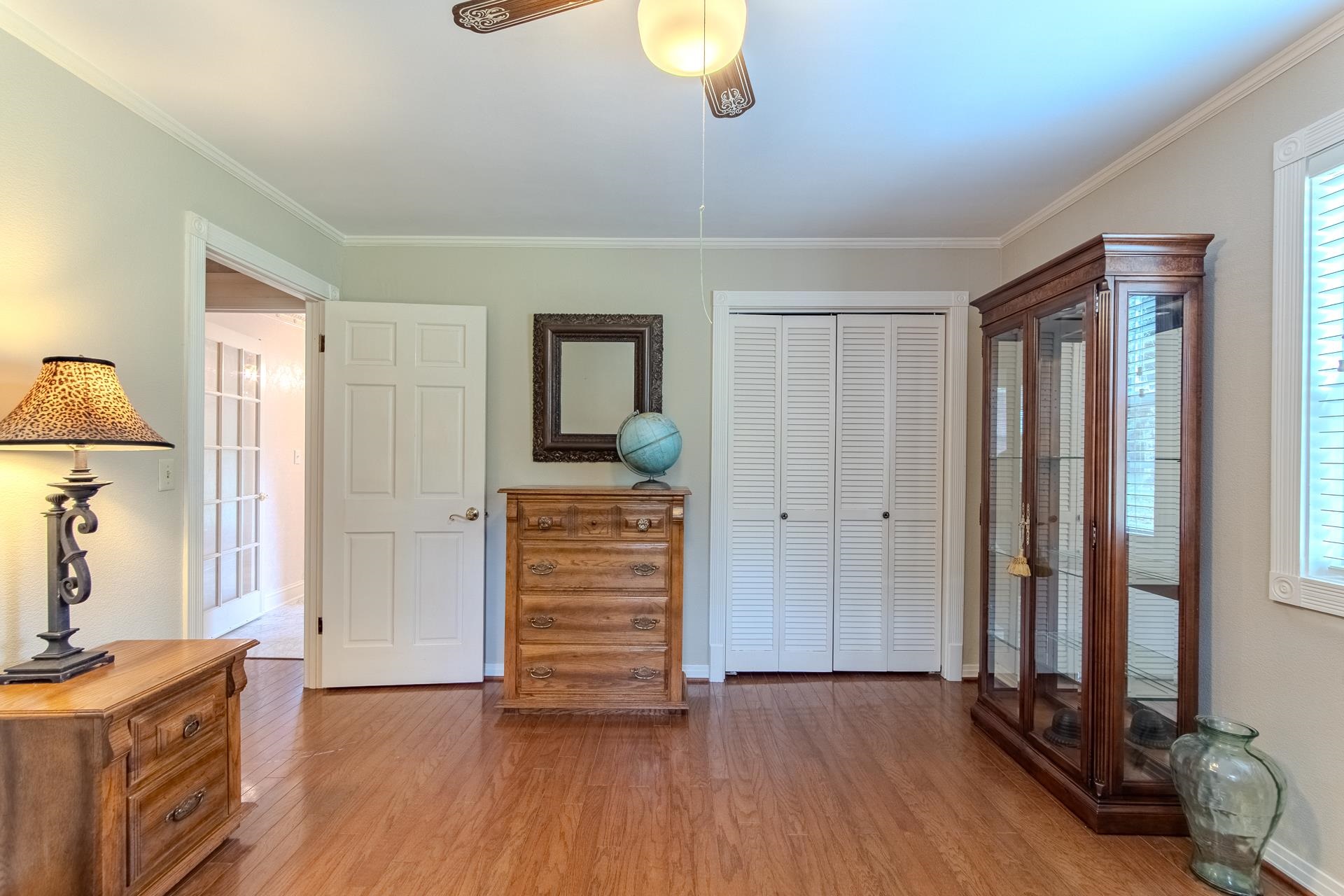 312 Smith Street Michie, TN 38357 - Photo 19 of 40 a view of empty room with wooden floor and fan