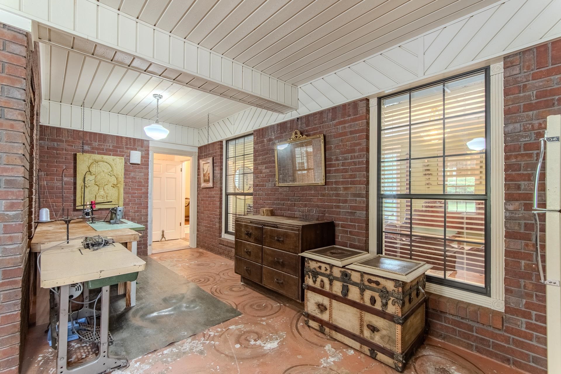 312 Smith Street Michie, TN 38357 - Photo 20 of 40 a living room with furniture windows and a fireplace