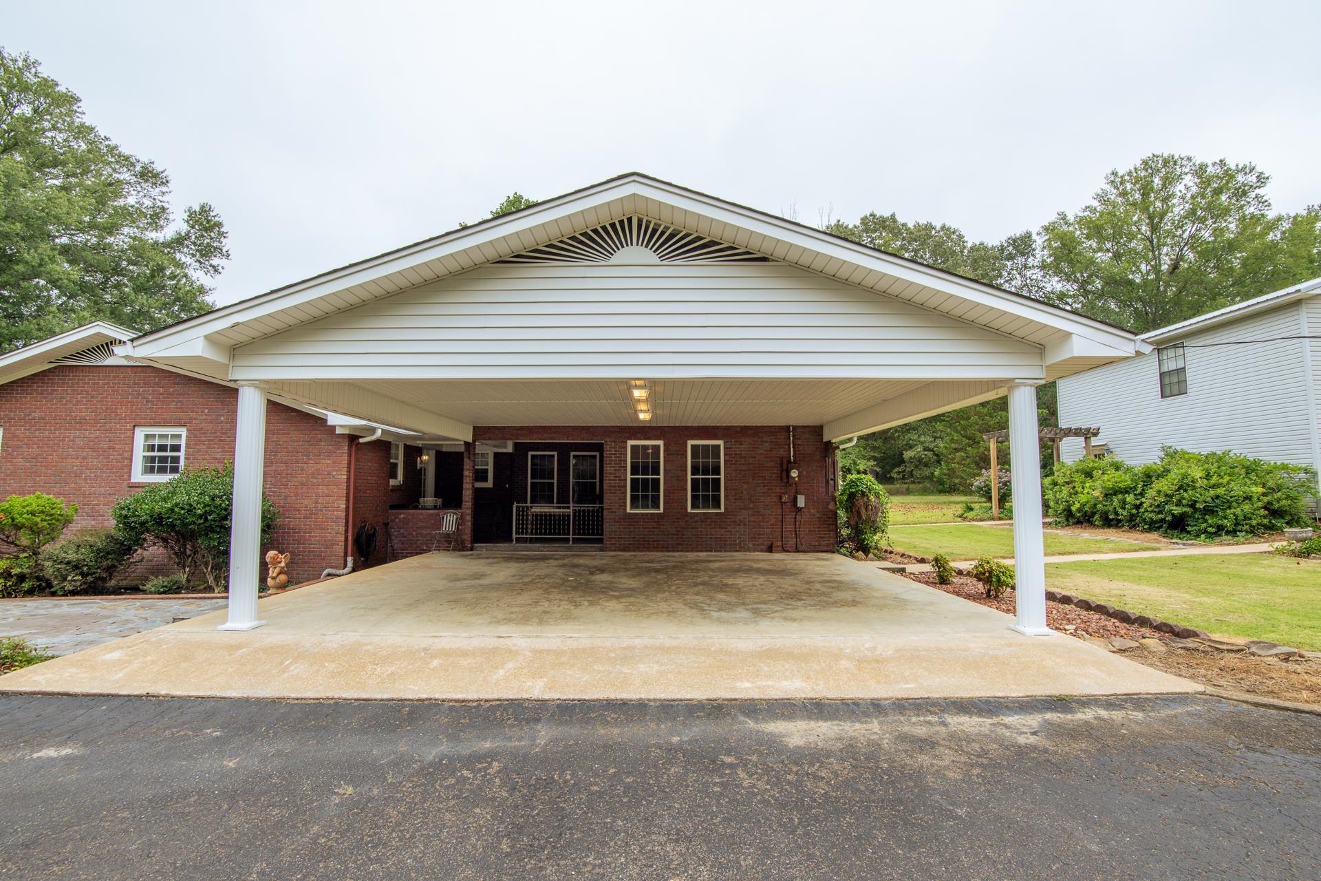 312 Smith Street Michie, TN 38357 - Photo 34 of 40 a front view of house with garage and yard