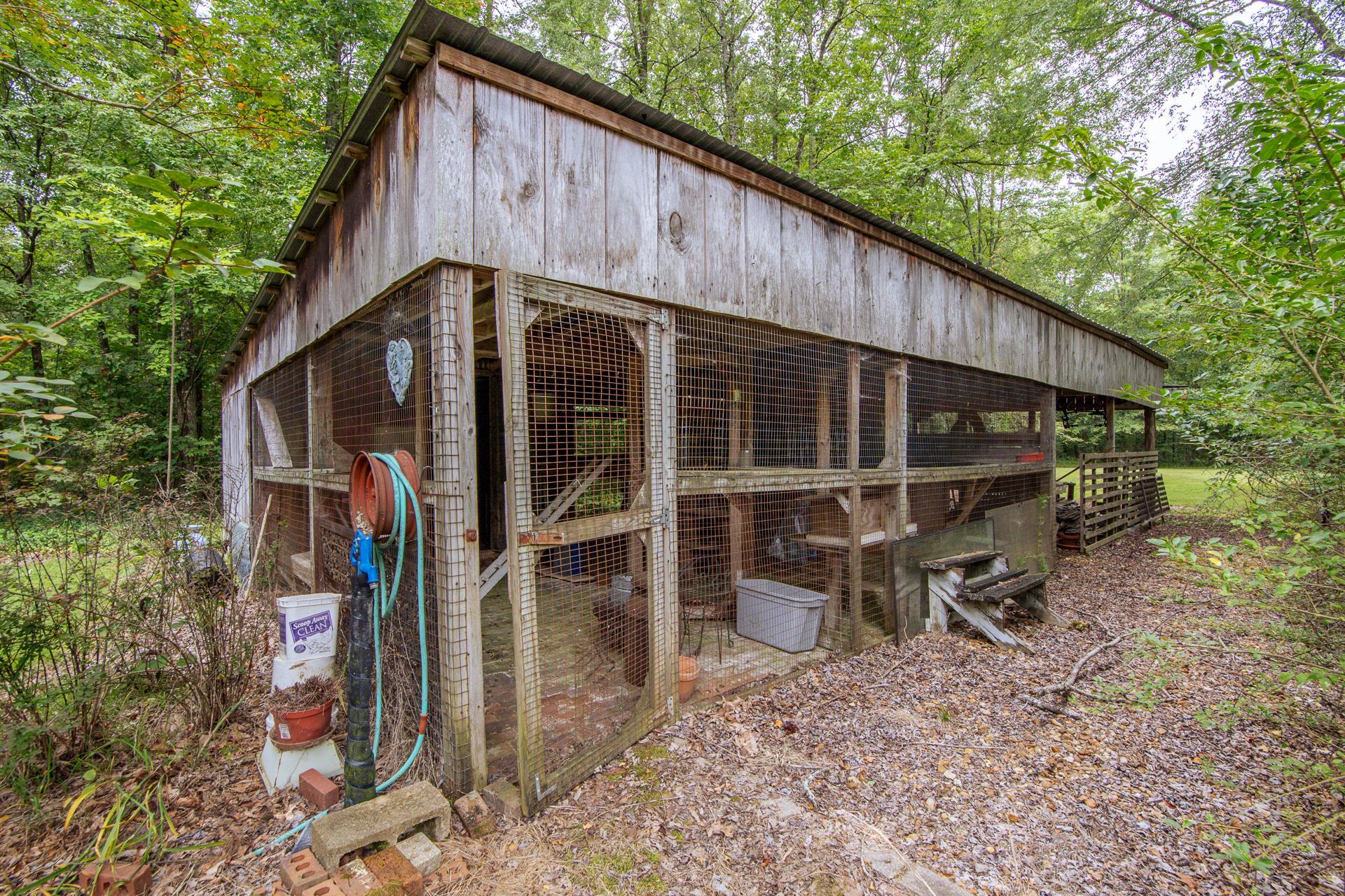 312 Smith Street Michie, TN 38357 - Photo 38 of 40 a view of a house with backyard and chairs