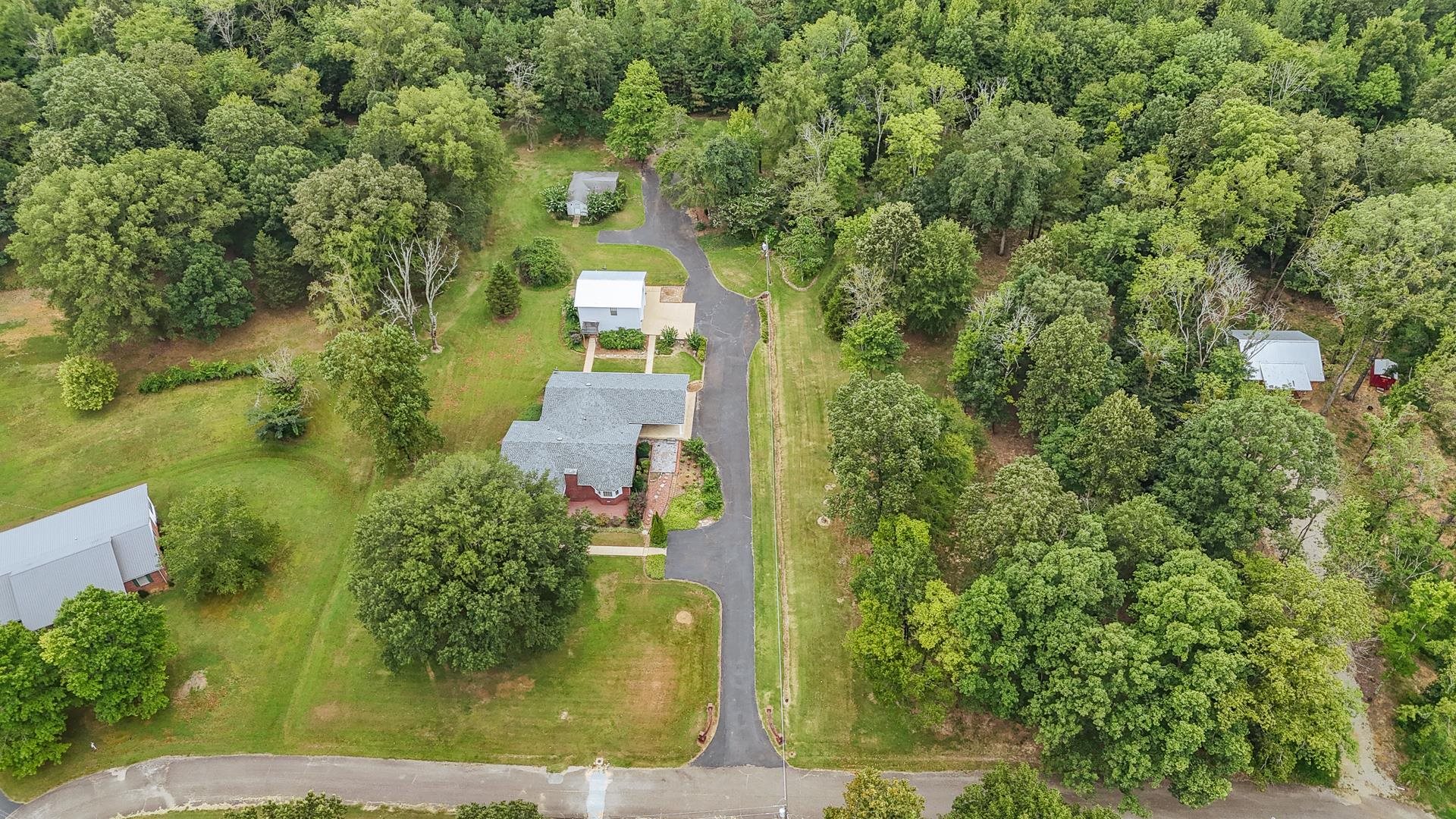 312 Smith Street Michie, TN 38357 - Photo 40 of 40 an aerial view of a house with a yard