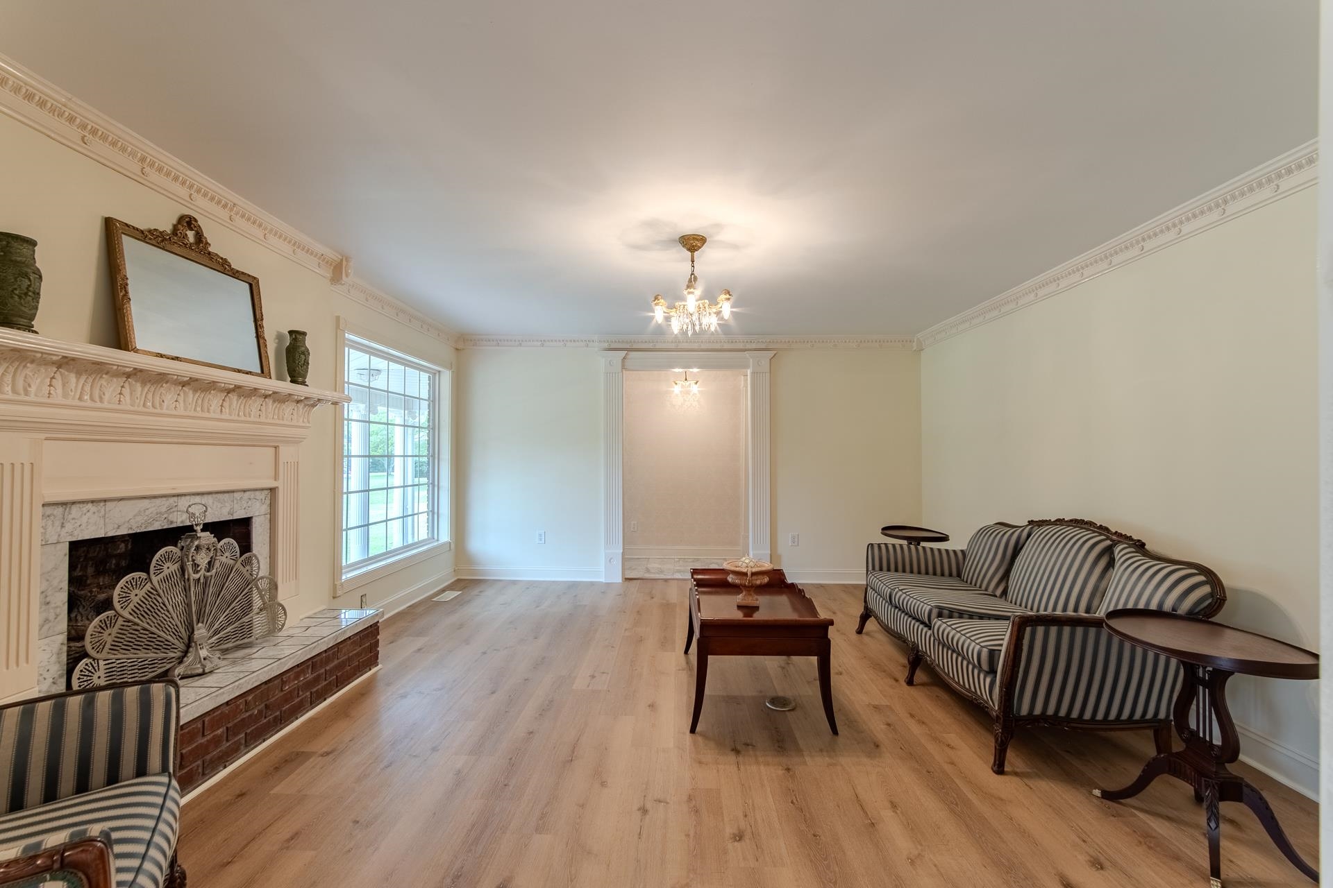 312 Smith Street Michie, TN 38357 - Photo 6 of 40 a living room with furniture and a fireplace