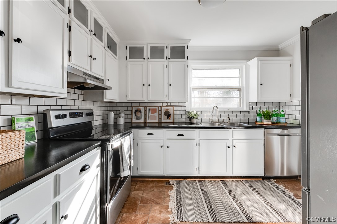 1200 Boroughbridge Road Richmond, VA 23225 - Photo 13 of 43 a kitchen with stainless steel appliances granite countertop white cabinets granite counter tops and a stove