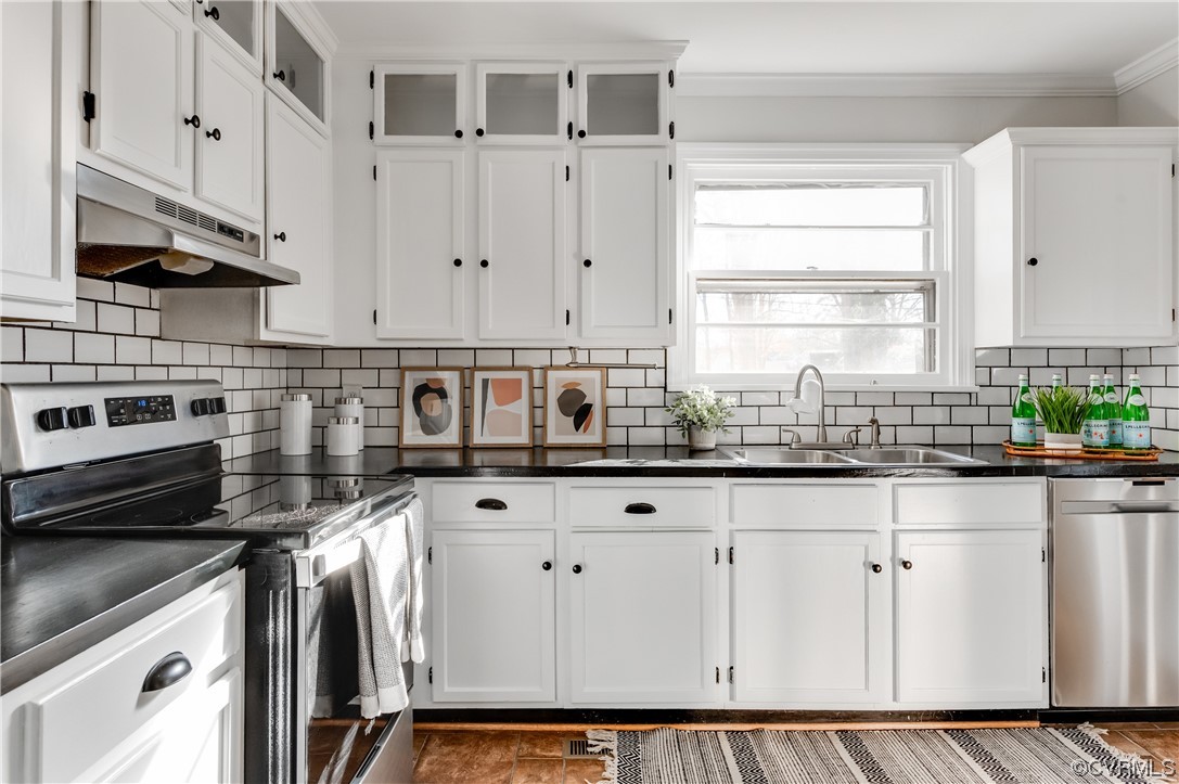 1200 Boroughbridge Road Richmond, VA 23225 - Photo 14 of 43 a kitchen with granite countertop white cabinets and white appliances