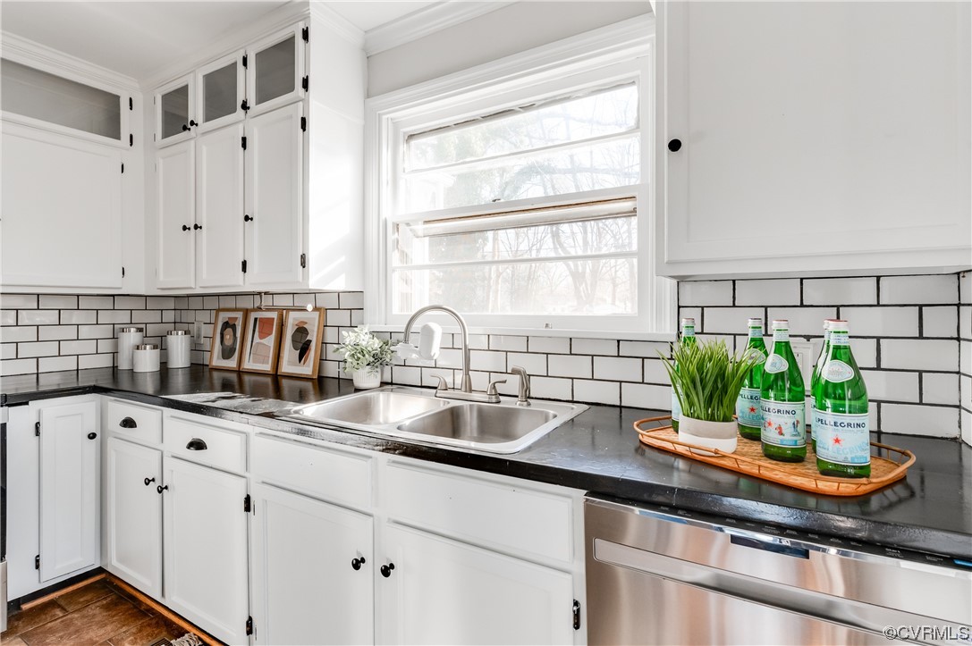 1200 Boroughbridge Road Richmond, VA 23225 - Photo 16 of 43 a kitchen with stainless steel appliances white cabinets a counter and a sink